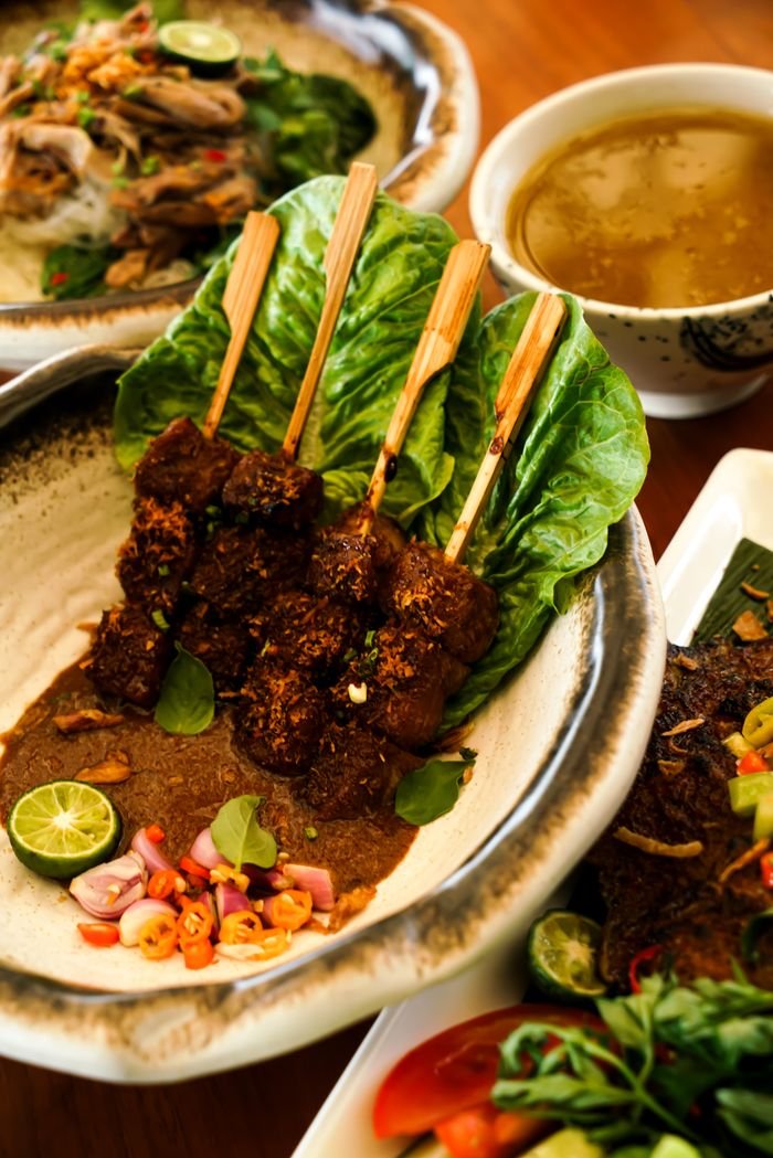 Indonesian satay skewers served with rich peanut sauce, perfect for authentic Asian cuisine experiences.